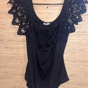 Woman’s black lace over the shoulder body suit